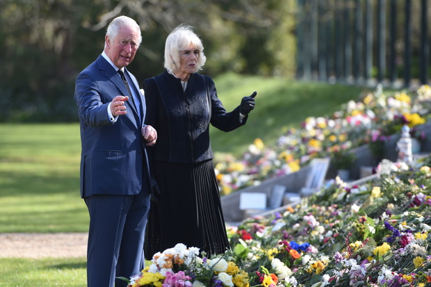 The Prince Of Wales And The Duchess Of Cornwall View Tributes Left By Members Of The Public Following The Death Of The Duke Of Edinburgh
