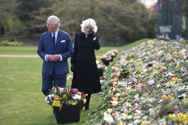 The Prince Of Wales And The Duchess Of Cornwall View Tributes Left By Members Of The Public Following The Death Of The Duke Of Edinburgh