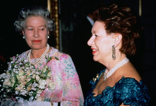 Queen Elizabeth II and Princess Margaret attend a charity co