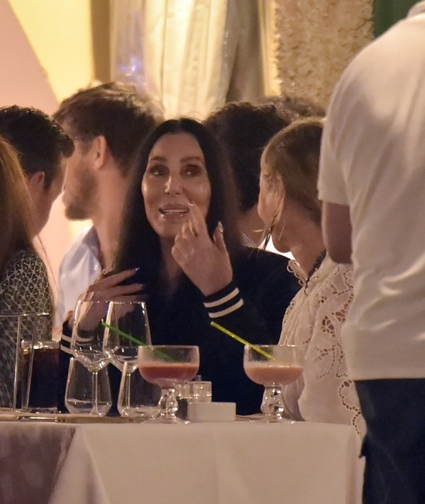 Singing legend Cher arrives in Portofino and dines with friends at the famous I Gemelli restaurant.