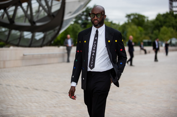 Street Style - Paris Fashion Week - Haute Couture Fall/Winter 2021/2022 : Day One