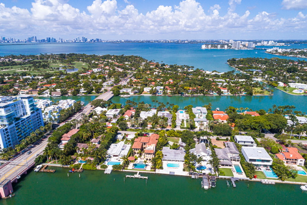 Miami Beach Florida,La Gorce Island,Allison Island,Biscayne Bay,water,waterfront homes residences,Indian Creek,63rd Street,downtown city skyline aeria