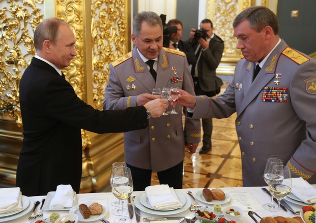 Russian President Vladimir Putin attends the reception at the Kremlin