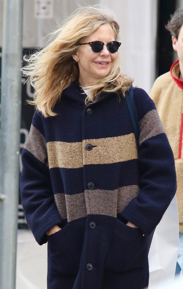 *EXCLUSIVE* Actress Meg Ryan is bundled up and all smiles during a cold windy day in NYC