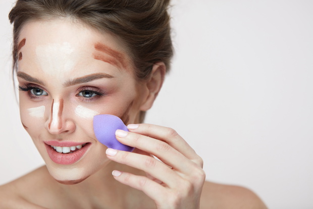 Face Makeup Beauty. Beautiful Female Applying Makeup With Sponge