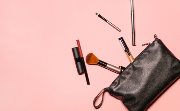 Stylish flat lay composition with decorative cosmetics: lip penc