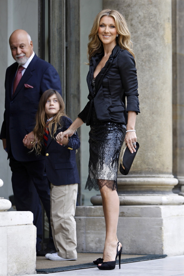 Canadian singer Dion arrives with her husband Angelil and son Rene-Charles at the Elysee Palace in Paris