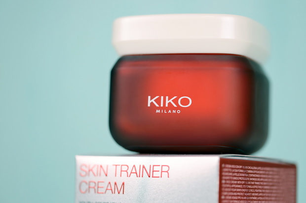 KHARKIV, UKRAINE - DECEMBER 16, 2021: Kiko Milano cream jar with company logo. Kiko Milano is an Italian cosmetics brand