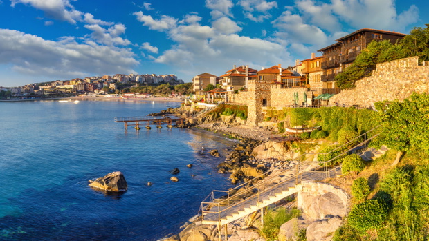 Coastal landscape banner, panorama - embankment with fortress wall in the city of Sozopol