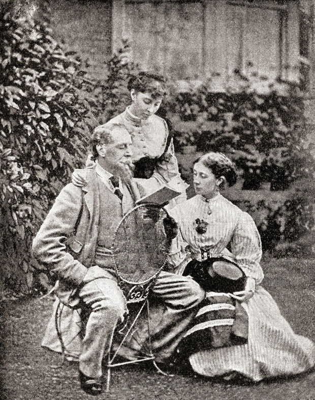 Charles Dickens reading to his daughters in 1845.  English writer and social critic of the Victorian era.  From The Strand Magazine, published January to June 1894.