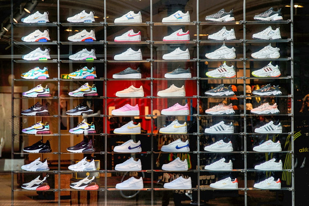 AMSTERDAM, THE NETHERLANDS - SEPTEMBER 15, 2019: Showcaseing a collection fashionable new shoes in a shop window of a retail store in a fancy shopping street in Amsterdam