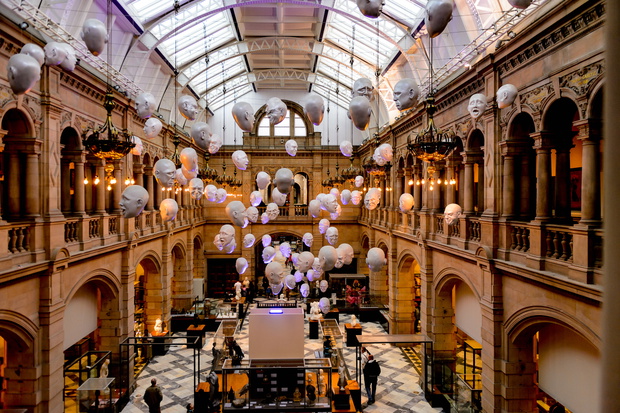 GLASGOW, SCOTLAND - JULY 16, 2016: Hanging heads in the East Hall of the Kelvingrove Art Gallery and Museum, Argyle Street, Glasgow. It's a popular attraction for the tourists
