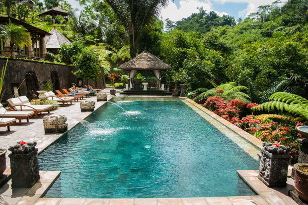 BALI,INDONESIA - JULY 29,2009: decorative pool adorns a resort in the interior part of bali near ubud