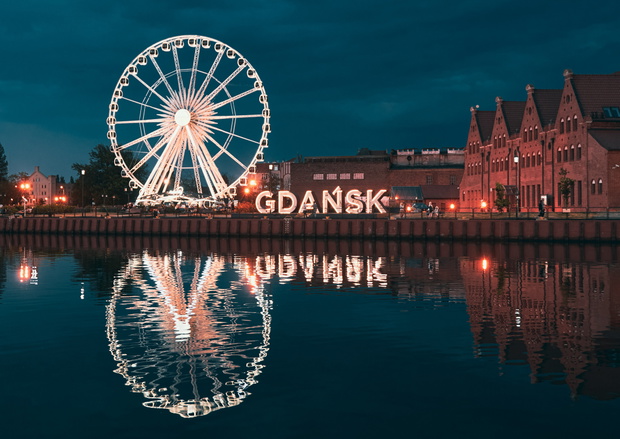 Reflection of the Ferris wheel in Gdansk, Poland. Old town cente