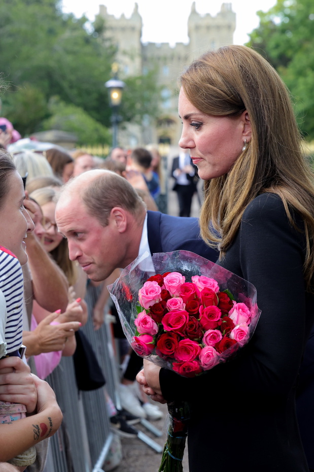 The Prince and Princess of Wales Accompanied By The Duke And Duchess Of Sussex Greet Wellwishers Outside Windsor Castle