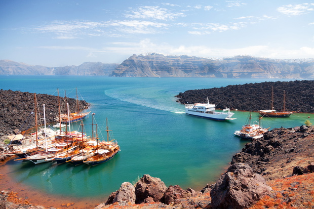 Nea Kameni volcanic island in Santorini, Greece. Ships from Fira stop by