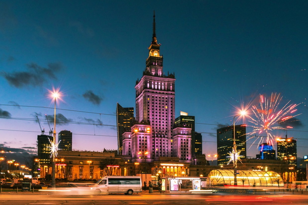 WARSAW / POLAND - 31 December 2019: The Palace of Science and Art during New Year celebration with fireworks, motion blur.