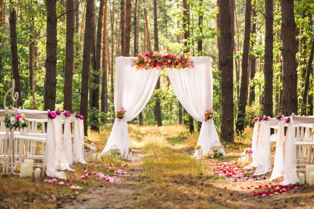 Beautiful romantic festive place made with wooden square and flo