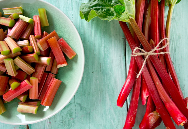 pieces of rhubarb on turquoise wooden surface