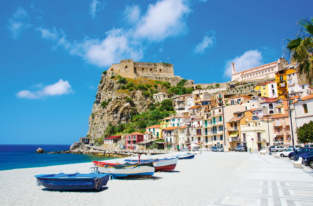 Fishing colorful boats on sandy beach, Scilla, Calabria, Italy