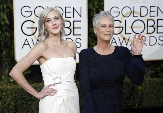 Annie Guest and Jamie Lee Curtis arrive at the 73rd Golden Globe Awards in Beverly Hills