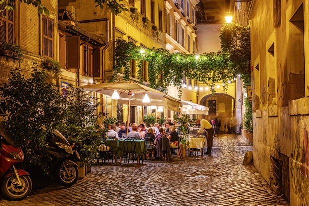 Night view of old street in Trastevere in Rome, Italy