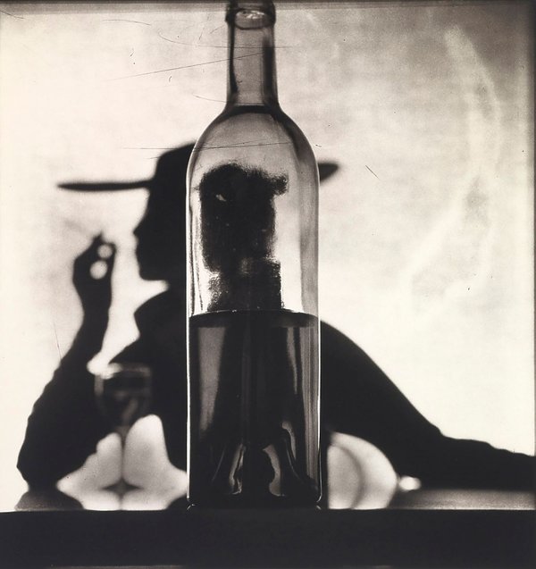 girl-behind-bottle-new-york-irving-penn-1949-307179-GALLERY600-a34b1e5