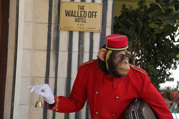 Street artist Banksy designs "The Walled Off" hotel in Bethlehem