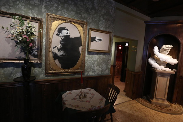 Street artist Banksy designs "The Walled Off" hotel in Bethlehem