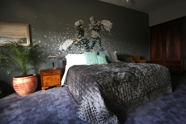Street artist Banksy designs "The Walled Off" hotel in Bethlehem