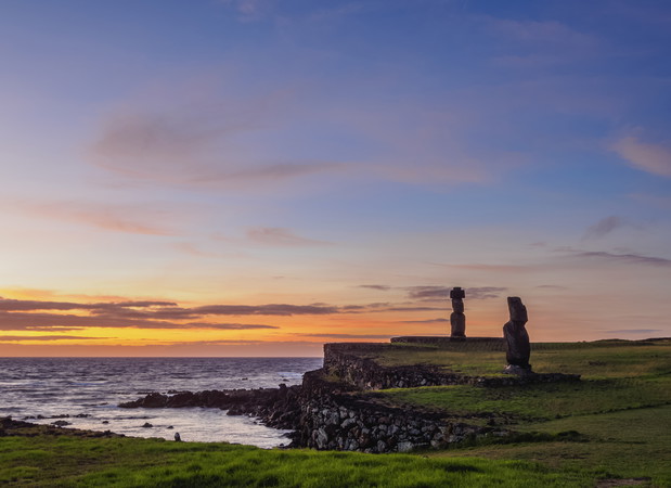 Moais in Tahai Archaeological Complex at sunset, Rapa Nui National Park, Easter Island, Chile