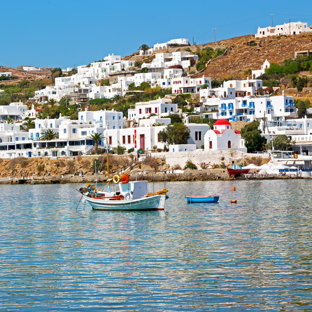 old history  in cyclades island harbor and boat santorini naksos europe house construction
