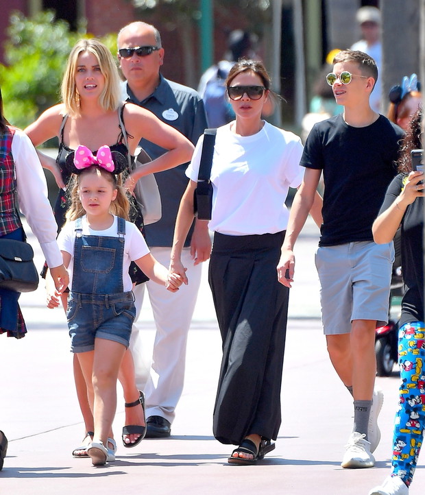 EXCLUSIVE: *NO WEB UNTIL 1030PM GMT 16TH APRIL* David and Victoria Beckham take their kids on a fun day out at Disneyland