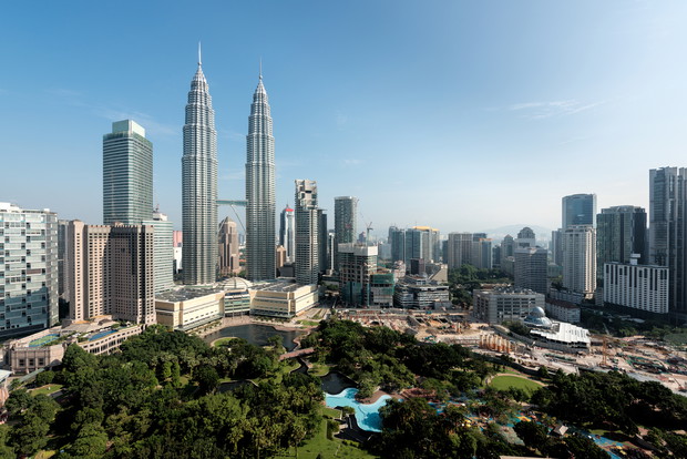Kuala Lumpur skyline and skyscraper in Malaysia. Downtown business district center of Kuala lumpur seeing Petronas twin tower in Malaysia. Asia.