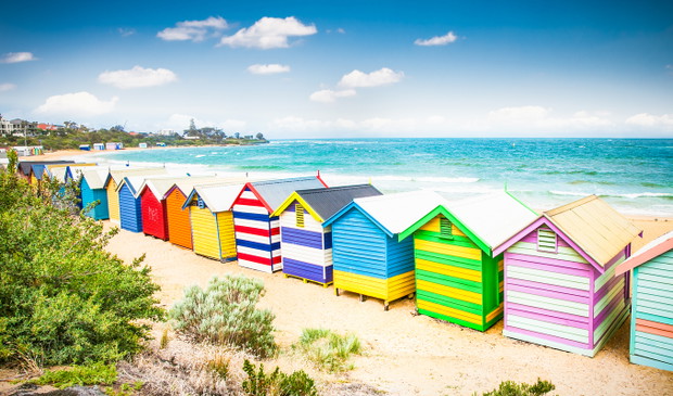 Beautiful Bathing houses on white sandy beach at Brighton beach,