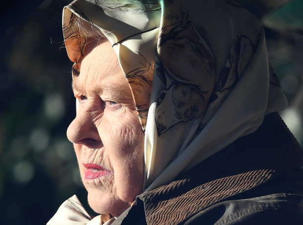 The Queen drives through Sandringham
