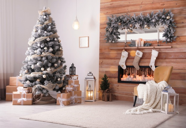 Festive interior with decorated Christmas tree and fireplace