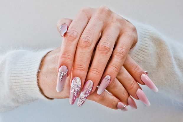 nails with pink Christmas decorations