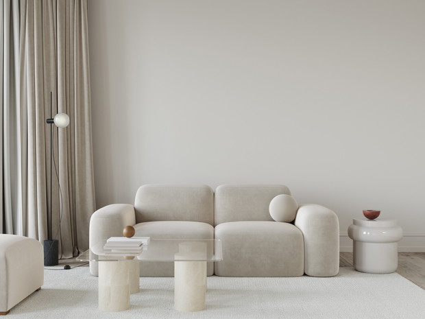 living room in beige tones with a stylish sofa, a glass table…