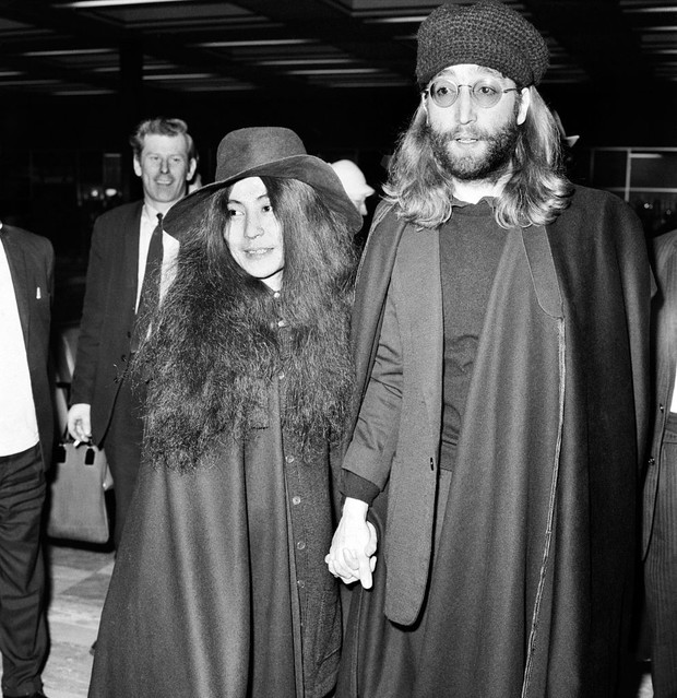 John Lennon and Yoko Ono dressed all in black, pictured at Heathrow today as they leave for Toronto. December 1969 Z1214
