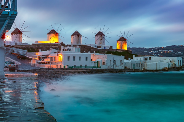 Traditional windmills at sunrise, Santorini, Greece