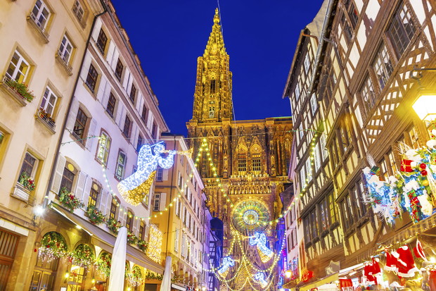 Festive Christmas illumination and decorations on streets of Strasbourg - capital of Christmas, Alsace, France.
