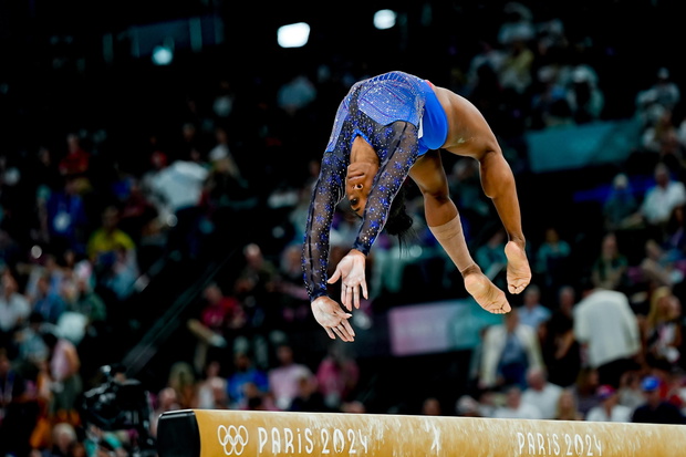 PARIS, FRANCE - AUGUST 1: Simone Biles of United States performing on the Balance Beam during the Women s All-Around Fin