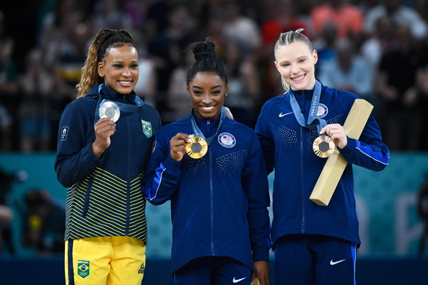 Vault - ANDRADE Rebeca ( BRA ) , Simone Biles ( USA ) and CAREY Jade ( USA ) celebrate with their medals during the 2024