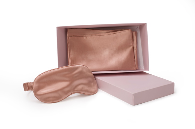 Silk sleeping mask and sleeping pillow sheet, soft luxury cushion. Pleasant sleep concept