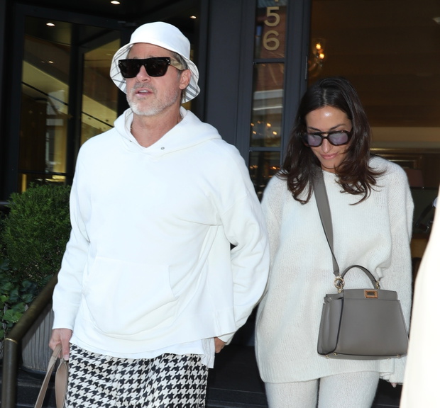 Brad Pitt and Ines de Ramon draw attention as they exit NYC hotel