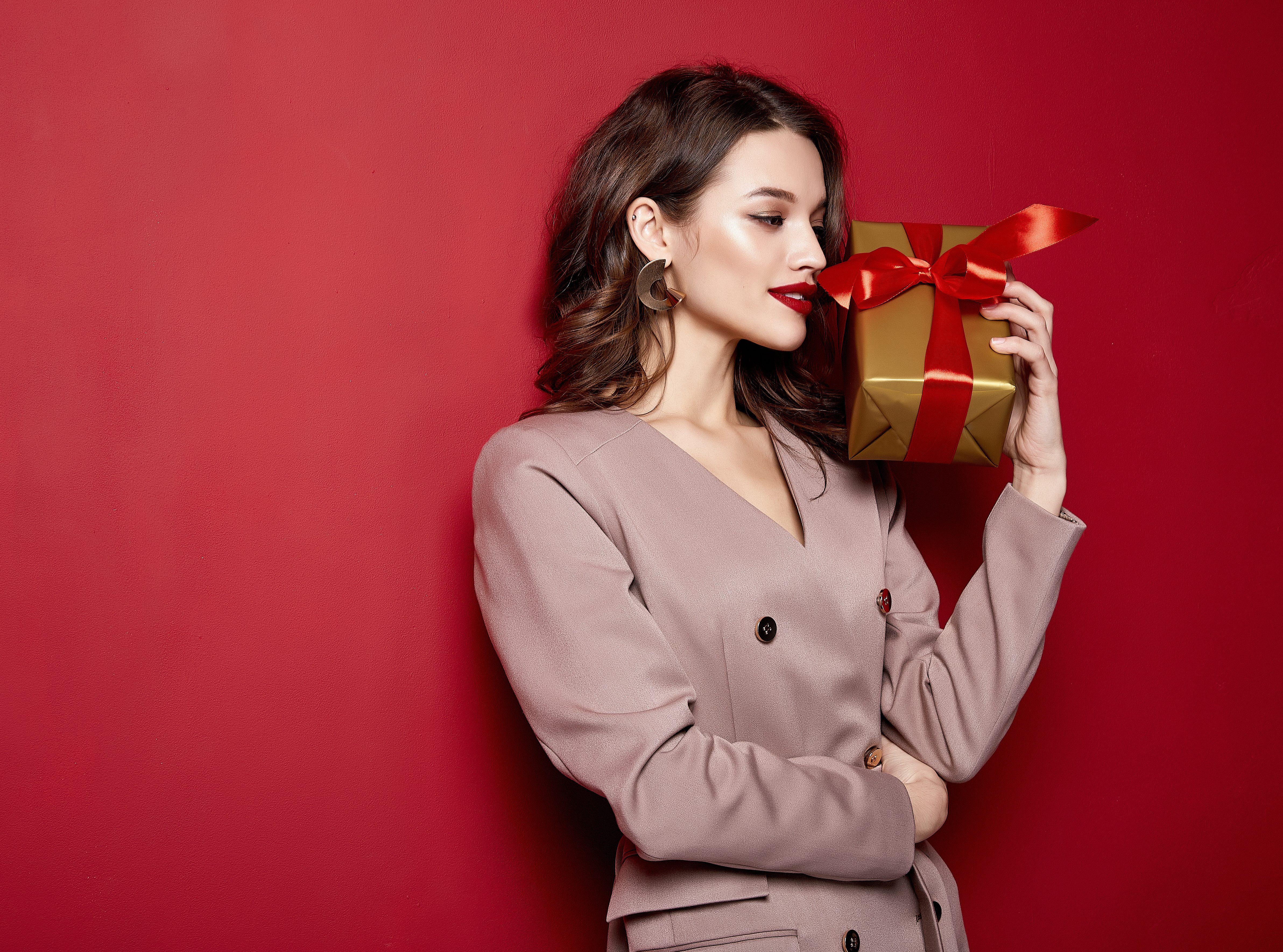 Sexy pretty lady fashion model beautiful woman wear style dress celebration happy holidays merry Christmas Eve New Year party hold gift box present surprise brunette makeup St. Valentine's Day.