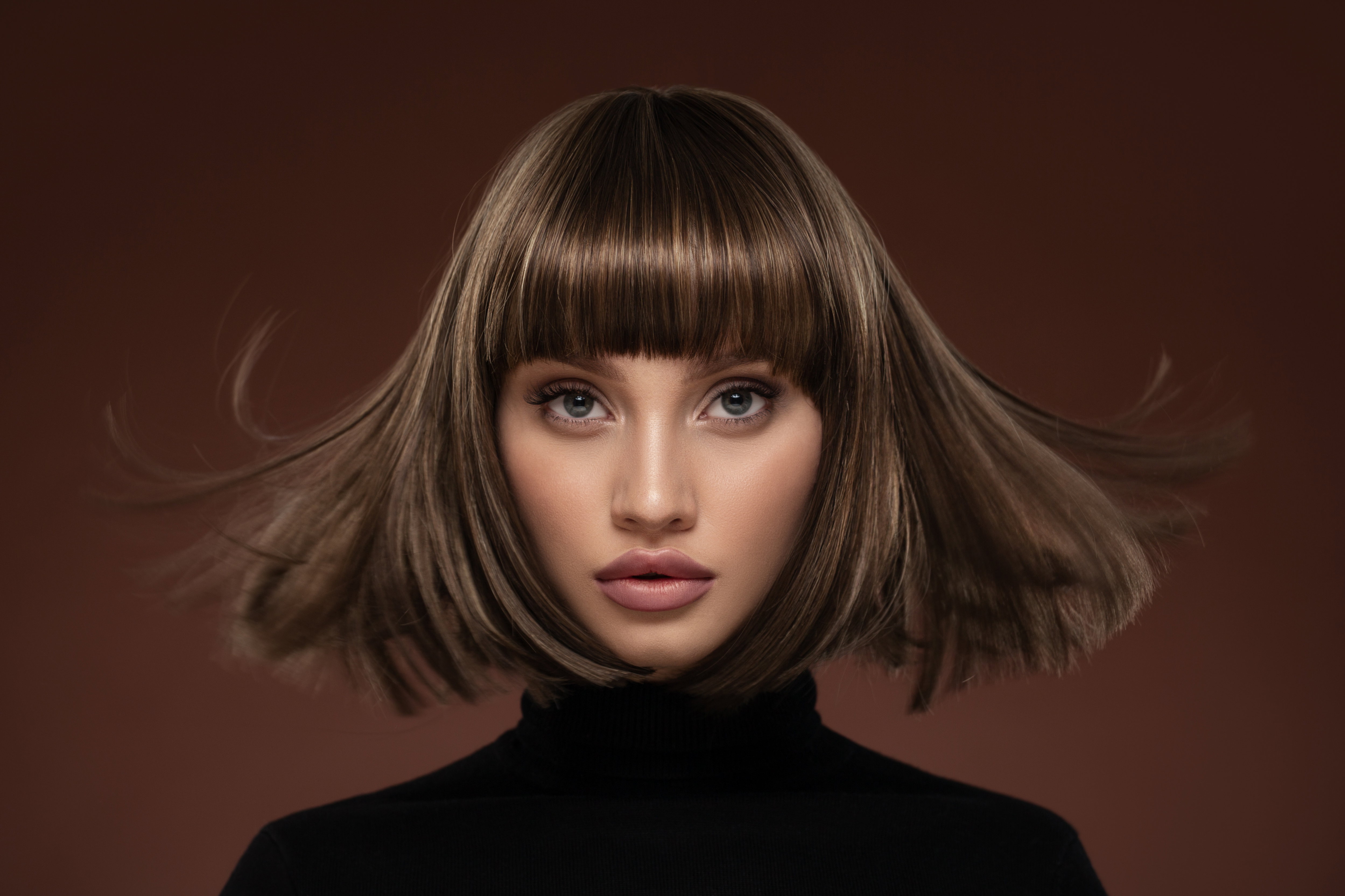 Portrait of a beautiful brown-haired woman with a short haircut