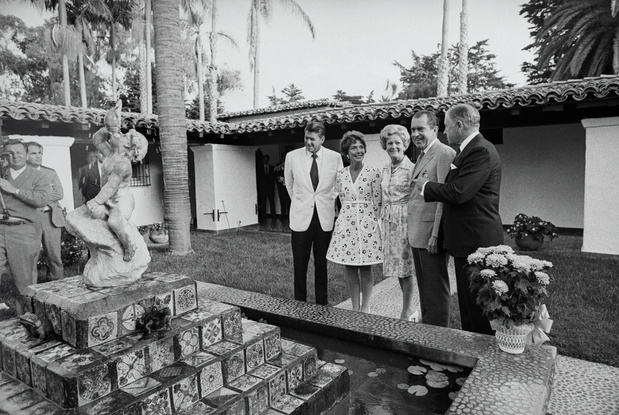 President Nixon Speaking with Colleagues