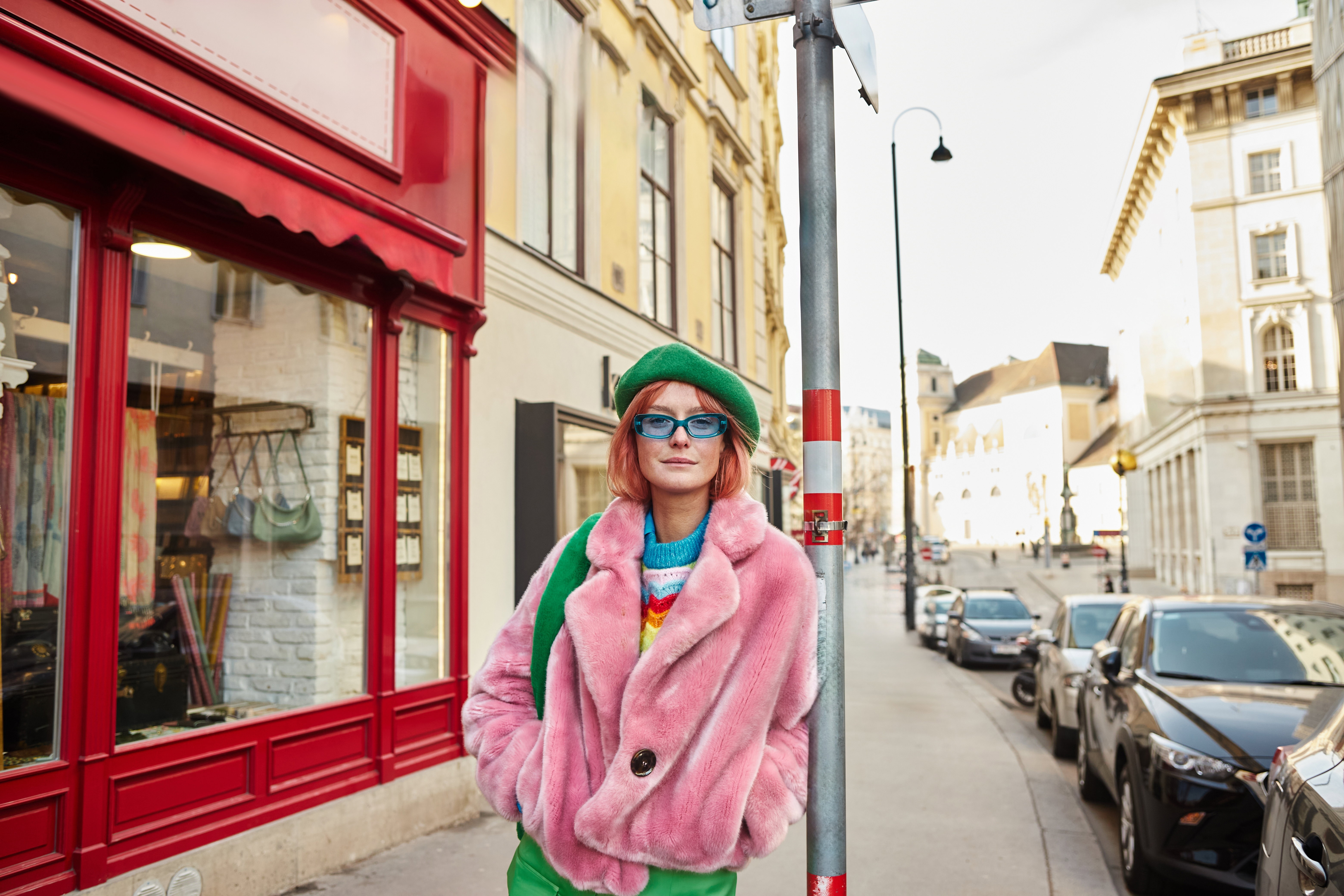 Trendy,Woman,In,Faux,Fur,Jacket,And,Sunglasses,Looking,At